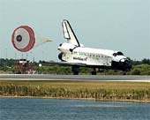 Raketoplán s brzdícím padákem